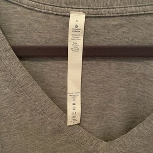 Grey lululemon top.